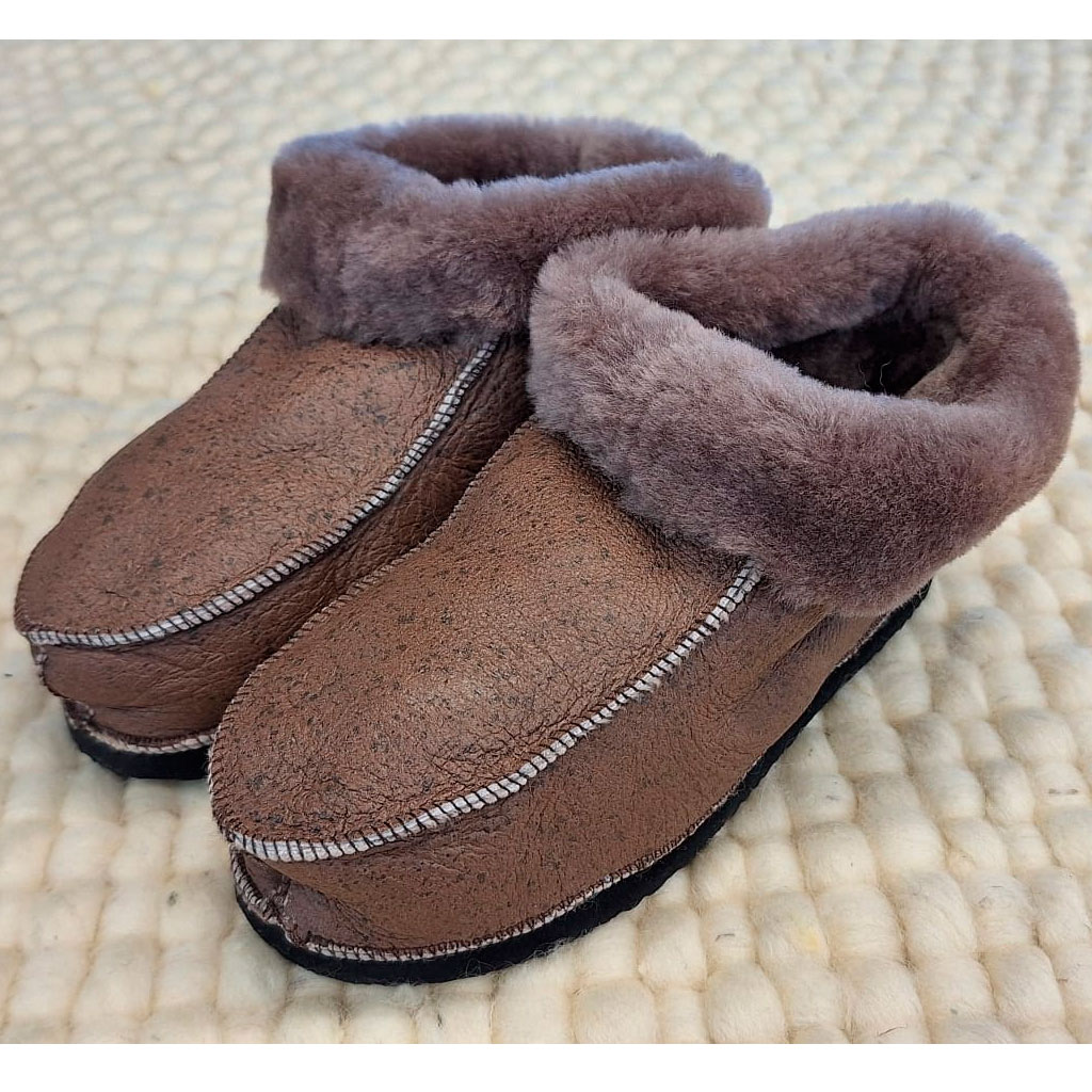 Pantufla botita de nio Oxido